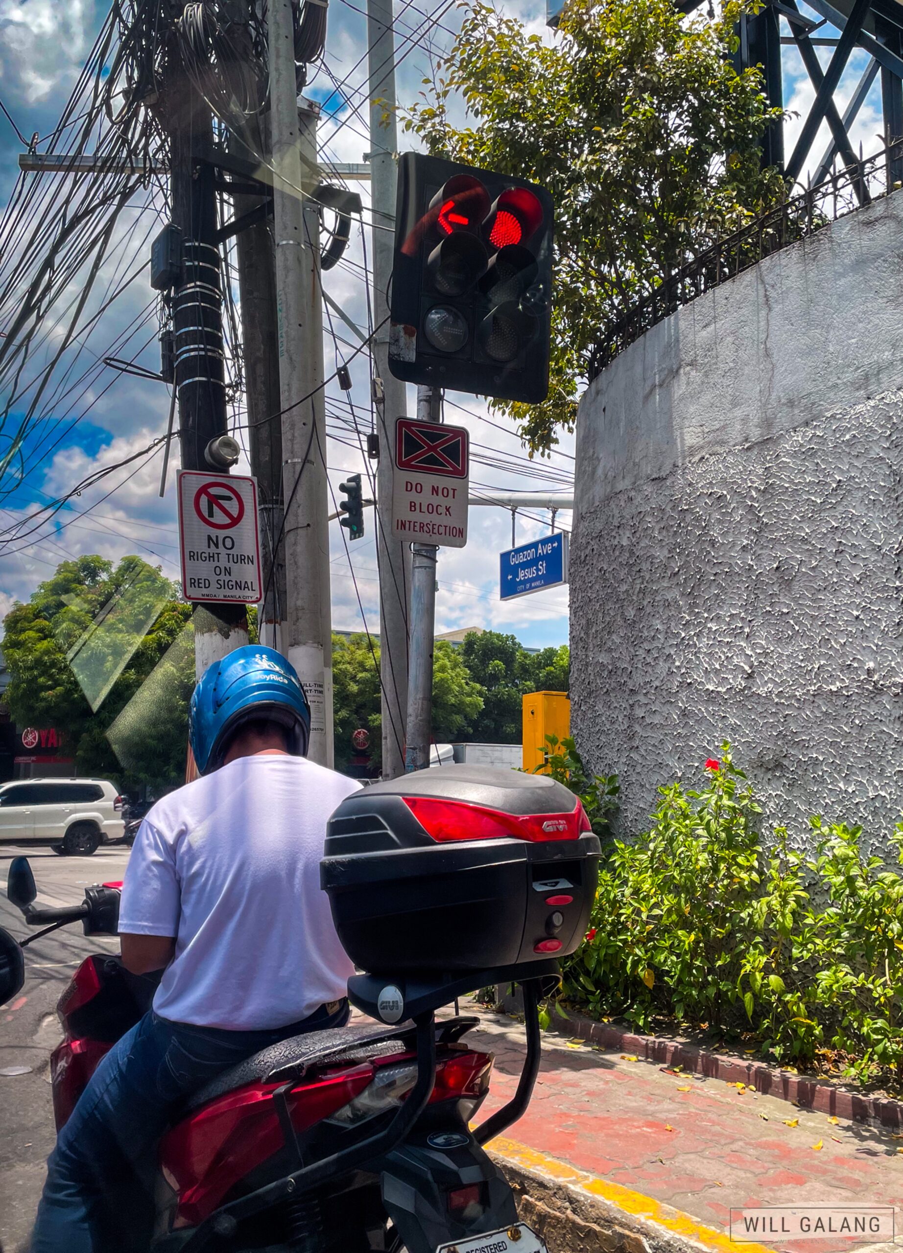 A motorcycle transport and delivery service rider.